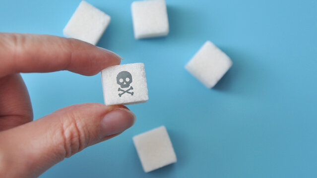 the image of a skull on sugar. A symbol of harm from sugar