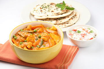 Indian food Mix vegetable curry with Tandoori roti or nan, Indian flat bread