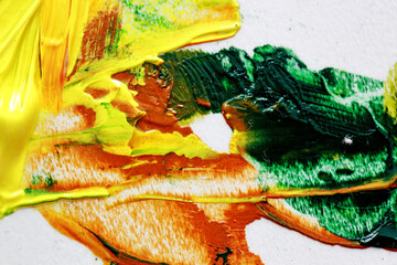 multicolor paint on palettes to create paintings