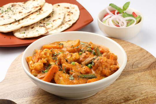 Indian food Mix vegetable curry with Tandoori roti or nan, Indian flat bread