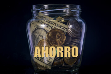 Money jar with AHORRO text