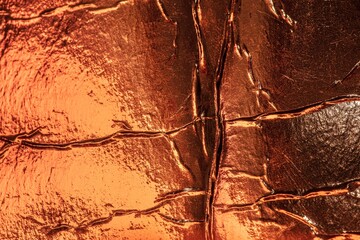 golden texture of metallized paper with cracks