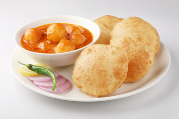 Indian food - Puri Bhaji. North India. Puri is a deep fried bread made from whole wheat flour & Served with Potato curry , bhaji or alu ki sabji.or Potato curry or dum alu curry