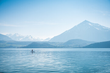 Standup Paddler in front of Niesen on Lake Thun