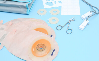 Set of colostomy bag on a blue background.