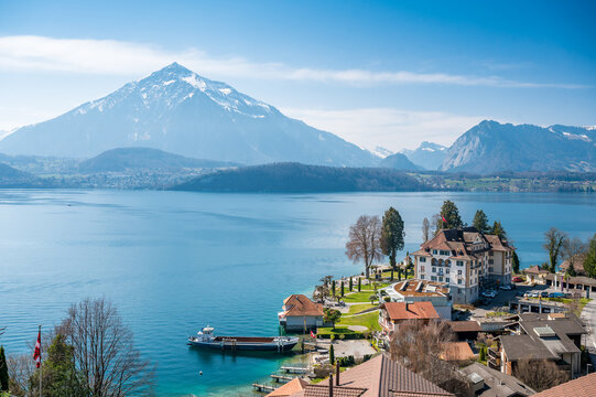 Lake Thun, Niesen and Parkhotel Gunten on a spring day seen from Gunten