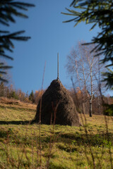 Amazing view on stock of hay on a lovely autumn day in the mountains
