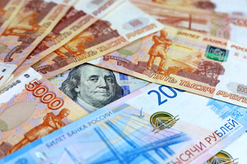 US dollar surrounded of russian rubles. Concept of exchange rate, american sanctions against Russia