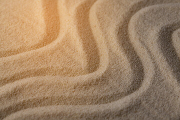 Fototapeta na wymiar Sand texture background with wave pattern.