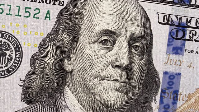 Woried president Benjamin Franklin twitching eyelid on US hundred dollar
