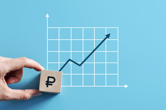The ruble icon and the upward growth chart. Symbol of the growth of the ruble exchange rate