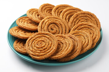 Traditional Indian Diwali snacks Chakali,murukku, Indian Traditional Tea Time Snack Chakli, a deep fried snack, It is known as Chakali, Murukku, Muruku, Murkoo, Chakri