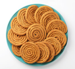 Traditional Indian Diwali snacks Chakali,murukku, Indian Traditional Tea Time Snack Chakli, a deep fried snack, It is known as Chakali, Murukku, Muruku, Murkoo, Chakri