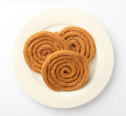 Traditional Indian Diwali snacks Chakali,murukku, Indian Traditional Tea Time Snack Chakli, a deep fried snack, It is known as Chakali, Murukku, Muruku, Murkoo, Chakri