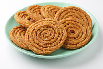Traditional Indian Diwali snacks Chakali,murukku, Indian Traditional Tea Time Snack Chakli, a deep fried snack, It is known as Chakali, Murukku, Muruku, Murkoo, Chakri