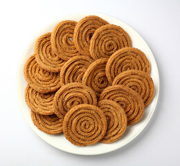Traditional Indian Diwali snacks Chakali,murukku, Indian Traditional Tea Time Snack Chakli, a deep fried snack, It is known as Chakali, Murukku, Muruku, Murkoo, Chakri
