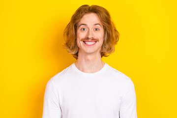 Obraz premium Photo of funky funny cheerful male with mustache relaxing on summer holidays isolated on yellow color background