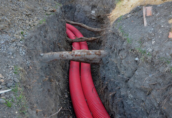 laying high voltage cables to the ground. the environment does not damage electric poles....