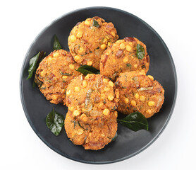 Tea time snack, Dal Vada or Parippu Vada or Paruppu Vadai , deep fried snacks savory food from Kerala fried in coconut oil.