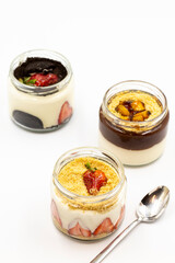 Various magnolia sweets isolated on white background. World cuisine delicacies. Magnolia dessert with banana, strawberry and biscuit. close up