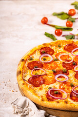 Top view of delicious and crispy pizza. American or Italian pizza. Cooking background concept.