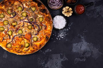 Top view of delicious and crispy pizza. American or Italian pizza. Cooking background concept.