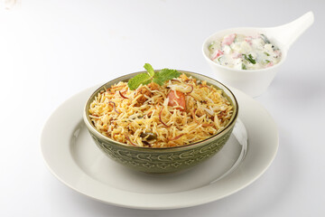 Vegetable Biryani a flavorful Indian rice dish with peas, carrots and potatoes with spicy spices. selective focus
