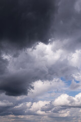 Storm cloudy dramatic sky with dark rainy grey cumulus cloud background texture, thunderstorm, heaven
