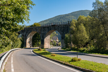 Fototapeta premium A big, old, ancient aqueduct bridge in the mountains