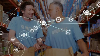 Animation of network of connections with icons over diverse volunteers in warehouse - Powered by Adobe