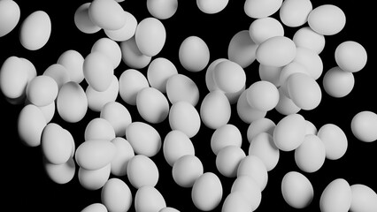 White eggs on a black background, the eggs fly up and float in the air