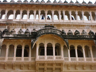 Jodhpur, Rajasthan, India, August 14, 2011: Balconies and arched windows of the Mehrangarh Fort in the blue city of Jodhpur, India