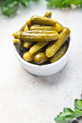 gherkins cucumbers salted pickled vegetable food meal food diet snack on the table copy space food background 