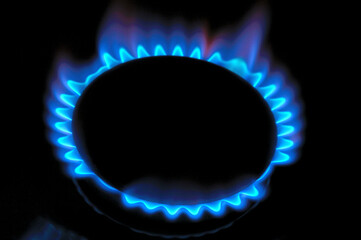 gas burner with burning gas. dark background