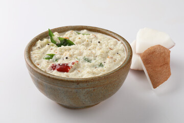 Indian food, chutney, Coconut chutney in a bowl with raw coconut ,Served with dosa, idli, vadai
