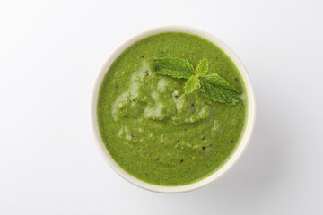 Green Mint Chutney or Pudina Chutney made with Coriander, Pudina & Spices. selective focus