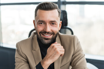 Portrait of a businessman looking at the camera with a smile