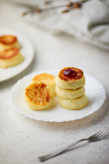  breakfast in the form of cottage cheese pancakes on a plate