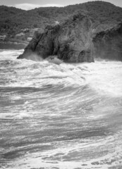 waves crashing on rocks