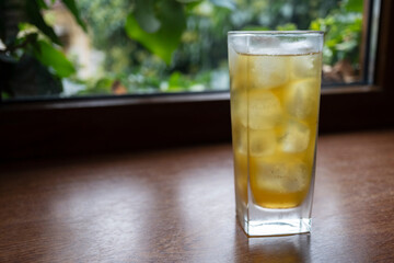 Alcoholic cocktail with ice and whiskey