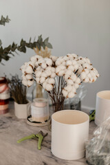 Floristic master class. Composition of dried flowers, cotton and eucalyptus