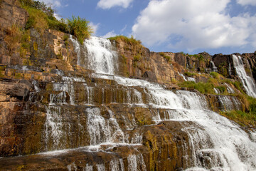 Pongour waterfall is also called a seven-storey waterfall because it has a 7-storey terraced stone system with nearly 40m height.
