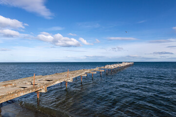 Old and rusty wooden pier in Punta Arenas, Chile