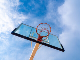basketball hoop and blue sky.