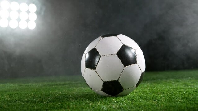Close-up of Soccer Ball on Football Field, Super Slow Motion at 1000 fps. Filmed on High Speed Cinematic Camera.