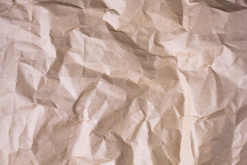 Brown craft paper crumpled texture. Recycled old paper abstract background.