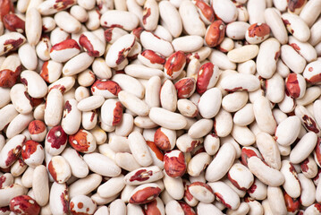 Background of white and red beans. Raw haricot ready for cooking