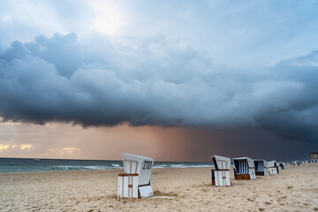 A dramatic storm cloud over the North Sea beach in Westerland. Sylt, Germany