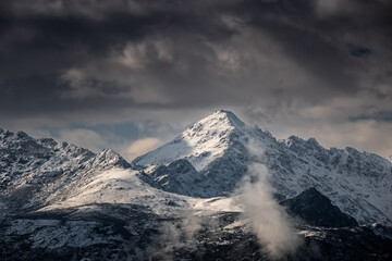 Fototapeta premium The snow capped peak of Monte San Parteo in the Balagne region of Corsica