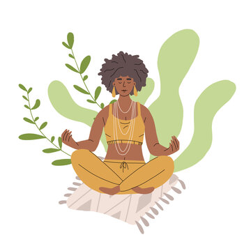 A girl meditates in nature. A young dark-skinned woman is sitting in a lotus position and doing yoga. Peace and a smile on your face.
